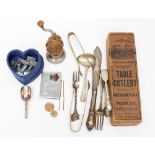 A nut grater, plated cutlery stamp case, pewter game markers,