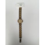 Hermes ladies two tone wristwatch, yellow metal and steel, 585827, strap length 6.