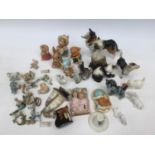 A collection of Pendelfin rabbits, Wade whimsies, German ceramic animal figures, etc,