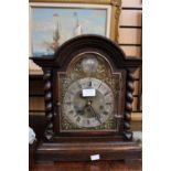 An oak cased bracket clock,