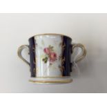 A Royal Worcester miniature loving cup, having puce backstamp,