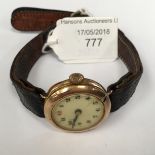 A 9ct gold mid size wristwatch, circa 1920s,