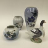 Three Royal Copenhagen vases (one af) with a Royal Copenhagen Goose figure (4)