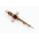 An late Victorian/Edwardian diamond and garnet set dagger brooch pin,