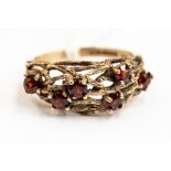 A six stone garnet 9ct gold, twig and tree bark design, size M, with a total gross weight approx 2.