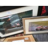 A framed and signed Nigel Mansell photograph;