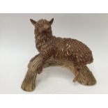 A Cobridge Stoneware figure 'Wolf in Sheep's Clothing',