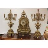 A brass clock garniture set large clock and candelabra, approx 60 cm high,