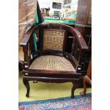 A 20th Century canework bergere chair,