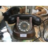 A 1950s Belgian copper desk telephone with bakelite handset