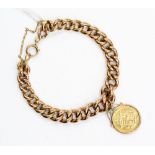 A half sovereign dated 1887 marked in 9ct gold suspended from a 9ct Albert chain bracelet,