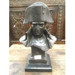 A cast metal bust of Napoleon marked 'LeComte' to back