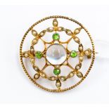 An Edwardian moonstone, green garnet and seed pearl open work brooch, set in 15ct gold,