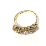 A diamond five stone ring, comprising graduated diamonds claw set in 18ct gold,