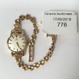 A ladies vintage 1970s 9ct Omega bracelet watch, champagne dial, batons, dial diameter approx 17mm,