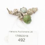 A pretty Diamond, green stone (possibly emerald) and Opal set flower brooch,