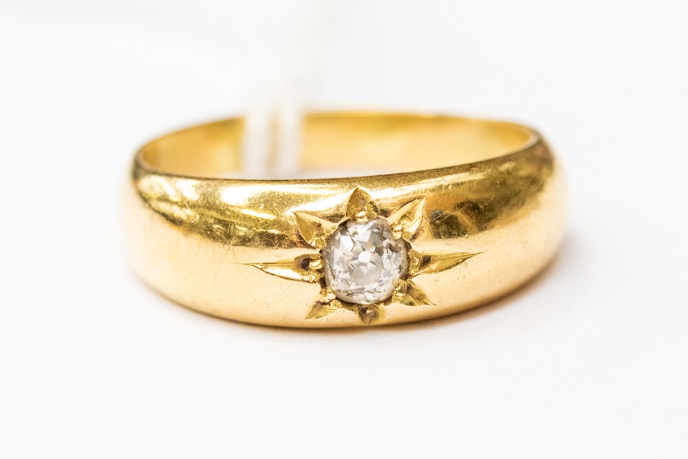 A diamond solitaire ring, with an old cut diamond star set in probably 18ct gold, size M,