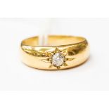 A diamond solitaire ring, with an old cut diamond star set in probably 18ct gold, size M,