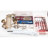 A quantity of assorted silver plated wares to include a pair of salad servers and part carving set