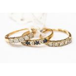 A group of three 9ct gold half eternity style rings,