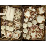 An extensive Royal Albert Old Country Roses dinner and tea service, including cake stand, plates,