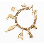 A 9ct gold charm bracelet and charm, 28.