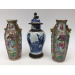 A pair of famille rose twin handled vases (both af) with a craquelure Japanese vase and cover,