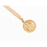 A 9ct gold St Christopher medal on a yellow metal chain, length approx 34'',