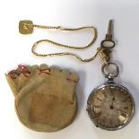 A ladies silver pocket watch with foliate design and gilt metal chain and a key