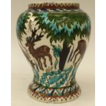 A European Art Pottery vase decorated with stags,