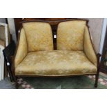 An Edwardian mahogany two seater settee, inlaid decoration,