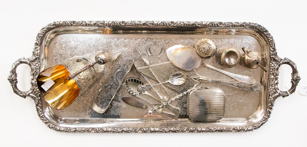 A large rectangular silver plated tray; together with sugar scuttle and scoop, a cruet set,