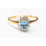 9 carat gold, aquamarine and diamond cluster ring,