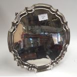 An Elizabeth II silver salver on four feet, Birmingham 1966, 15.