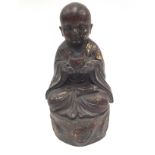 A Chinese 20th Century bronze Buddha with gold splash work design