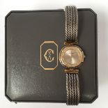 A cased Philippe Charriol wrist watch,