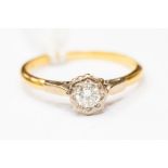 A solitaire diamond ring, with an illusion set brilliant cut diamond, approx diamond weight 0.