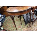 An early 20th Century mahogany demilune card table,