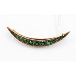 A Victorian emerald crescent brooch, 9ct gold with diamond accents, approx 3.