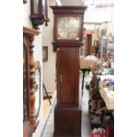 A George III and later mahogany eight day longcase, the mechanism with silvered dial,