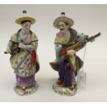 A pair of continental figurines of oriental musicians