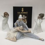 A Lladro figure of a ballerina and male dancer,