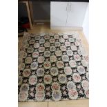 A mid 20th Century hand knotted Geometric woolwork rug