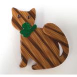 A Lea Stein 'Cat with a Bow' brooch,