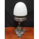 Early 20th Century pewter table lamp with Griffin base,