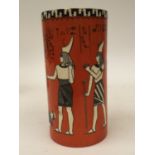 A Royal Doulton cylinder vase, orange ground with Egyptian figures, No.