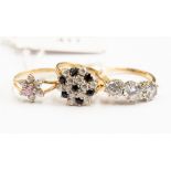 Three 9ct gold cubic zirconia set dress rings,