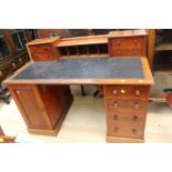 A Victorian mahogany twin pedestal desk, the top with four drawers,