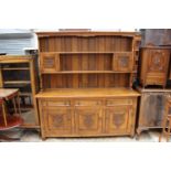 A traditional oak dresser and rack, of recent manufacture, hand crafted,