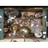 A quantity of small oil lamps to include brass,